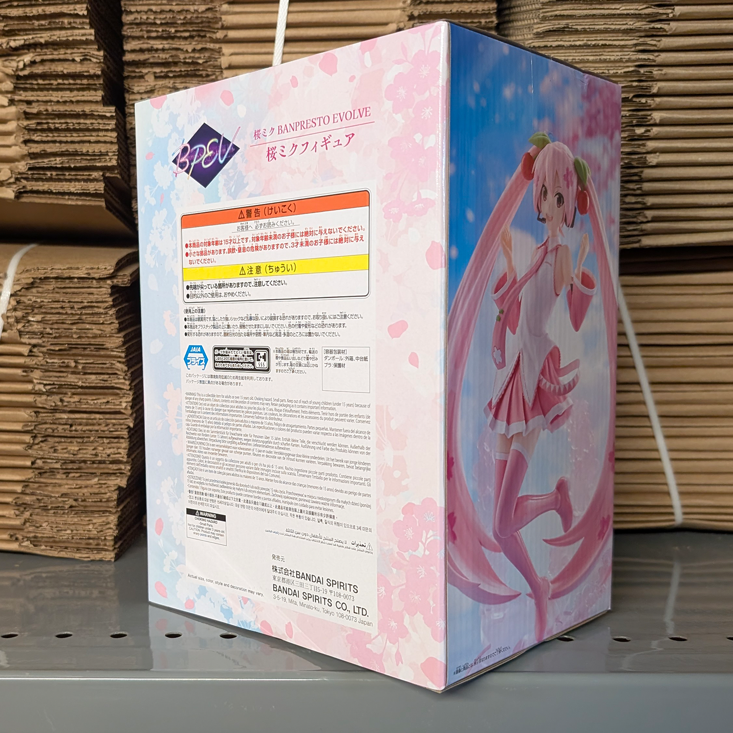 Sakura Miku Evolve 9" Banpresto Anime Statue Hatsune Miku Figure boxed collectible with pink and blue packaging details