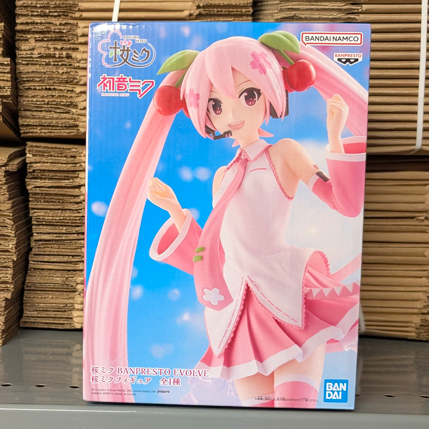 Sakura Miku Evolve 9" Banpresto Anime Statue Hatsune Miku Figure new in box with pink cherry blossom design packaging