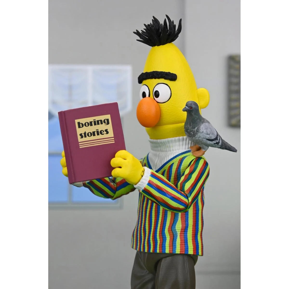 Bert - Sesame Street Ultimate NECA 7-Inch Scale Action Figure in colorful striped sweater holding book and pigeon accessory new in box