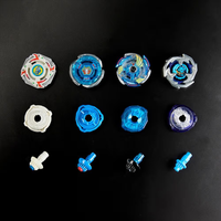 Hasbro Beyblade 25th Anniversary X Edition set with four blue and white tops and matching launchers on black background
