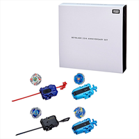 Hasbro Beyblade 25th Anniversary Set with four colorful spinning tops and matching launchers in white packaging