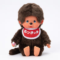 8" Monchhichi Classic BrownGirl in Red Bib with Japanese Character Logo and Blue Eyes by Sekiguchi