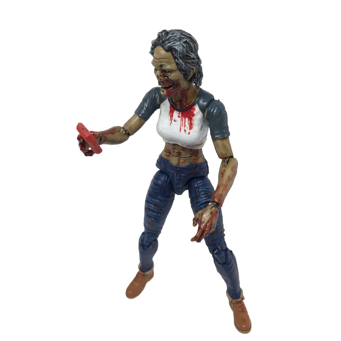 Action figure of a character with a distressed appearance on a white background