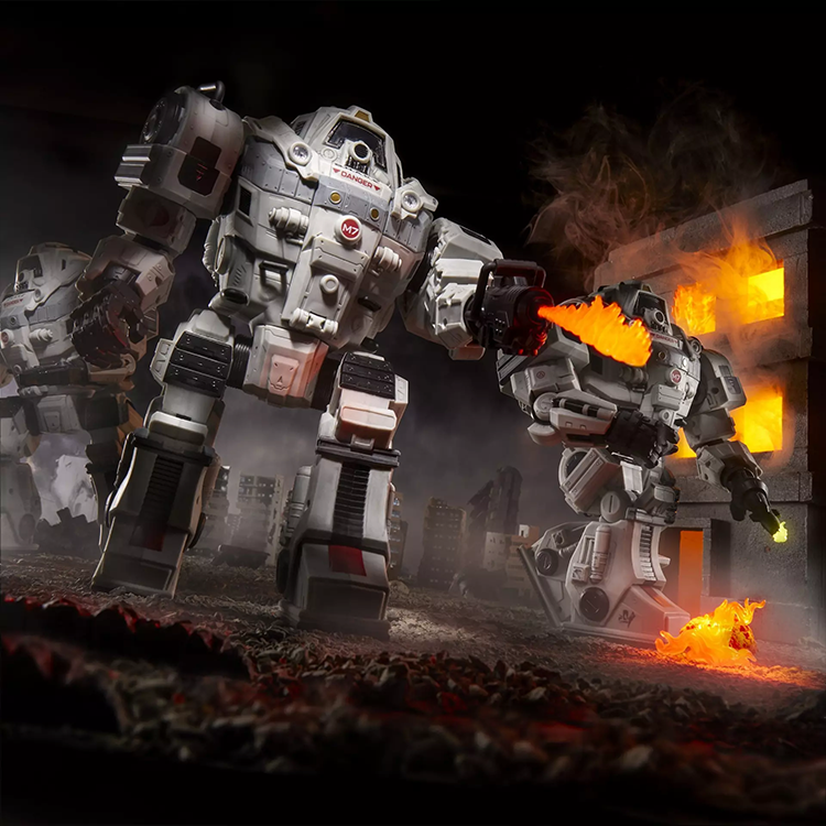 Hasbro G.I. Joe Cobra S.N.A.K.E battle suit figures with flame effects in a destroyed urban diorama setting