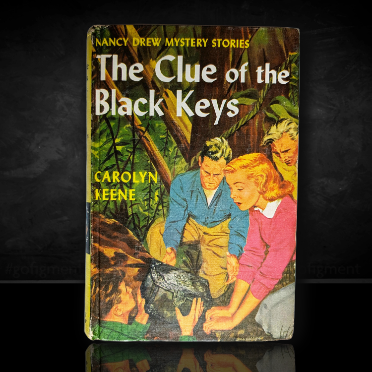 Vintage edition of The Clue of the Black Keys by Carolyn Keene with colorful cover illustration of three young people investigating.