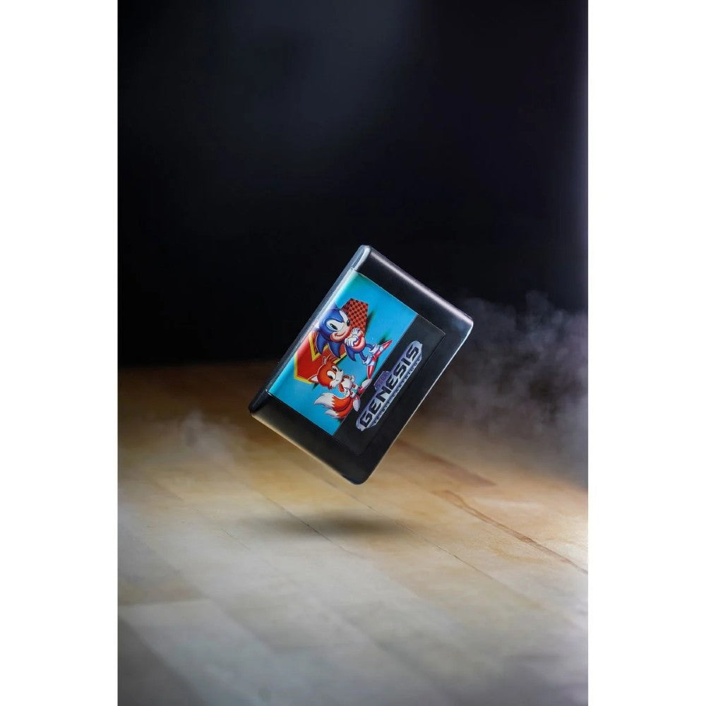 Console Heroes Sega Genesis Sonic the Hedgehog 2 Cartridge Diorama Playset floating above wooden surface with smoky background