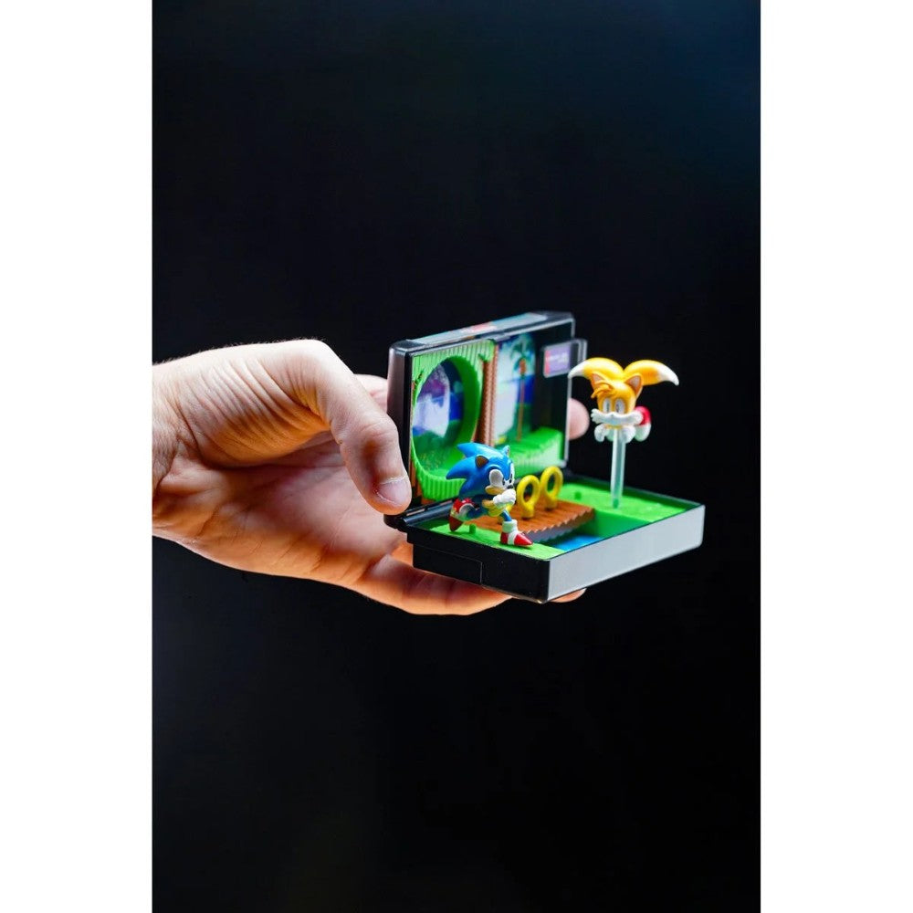 Hand holding Console Heroes Sega Genesis Sonic the Hedgehog 2 Cartridge Diorama Playset with detailed game scene and characters