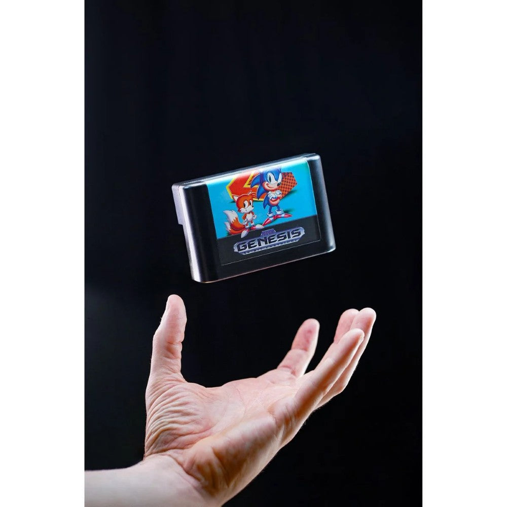 Console Heroes Sega Genesis Sonic the Hedgehog 2 Cartridge Diorama Playset held above open hand against black background