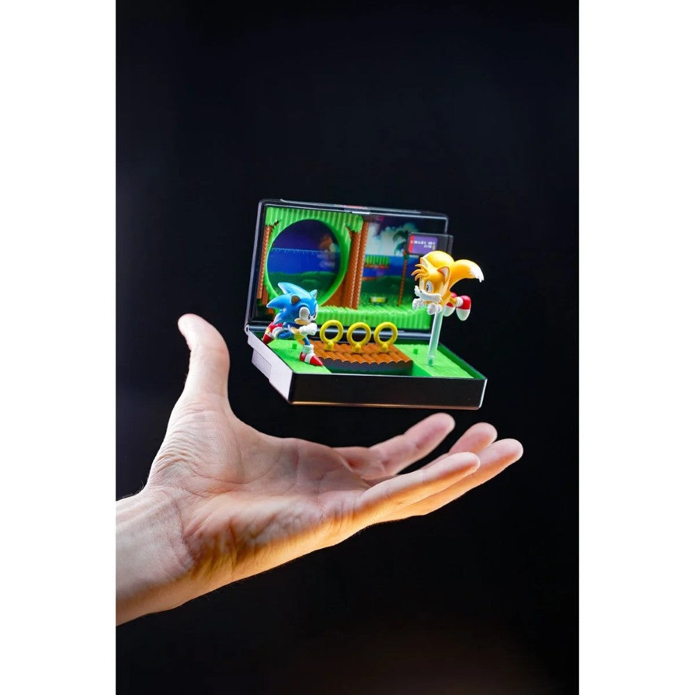 Hand holding Console Heroes Sega Genesis Sonic the Hedgehog 2 Cartridge Diorama Playset with Sonic and Tails figures