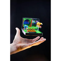 Hand holding Console Heroes Sega Genesis Sonic the Hedgehog 2 Cartridge Diorama Playset with Sonic and Tails figures