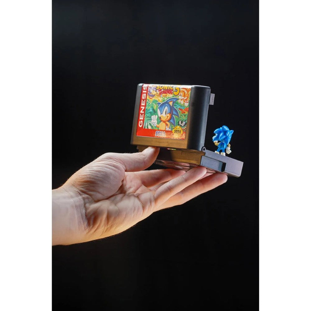 Hand holding Console Heroes Sega Genesis Sonic the Hedgehog 3 Cartridge Diorama Playset (Copy) collectible toy display.