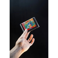Hand holding Console Heroes Sega Genesis Sonic the Hedgehog 3 Cartridge Diorama Playset (Copy) against black background