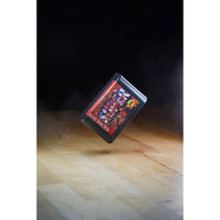 Console Heroes Sega Genesis Genesis Street Fighter II Cartridge Diorama Playset floating above wooden surface in dramatic lighting