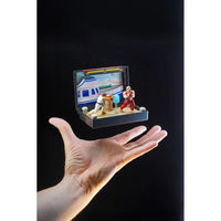 Hand holding Console Heroes Sega Genesis Genesis Street Fighter II Cartridge Diorama Playset with fighting figures and arcade backdrop.