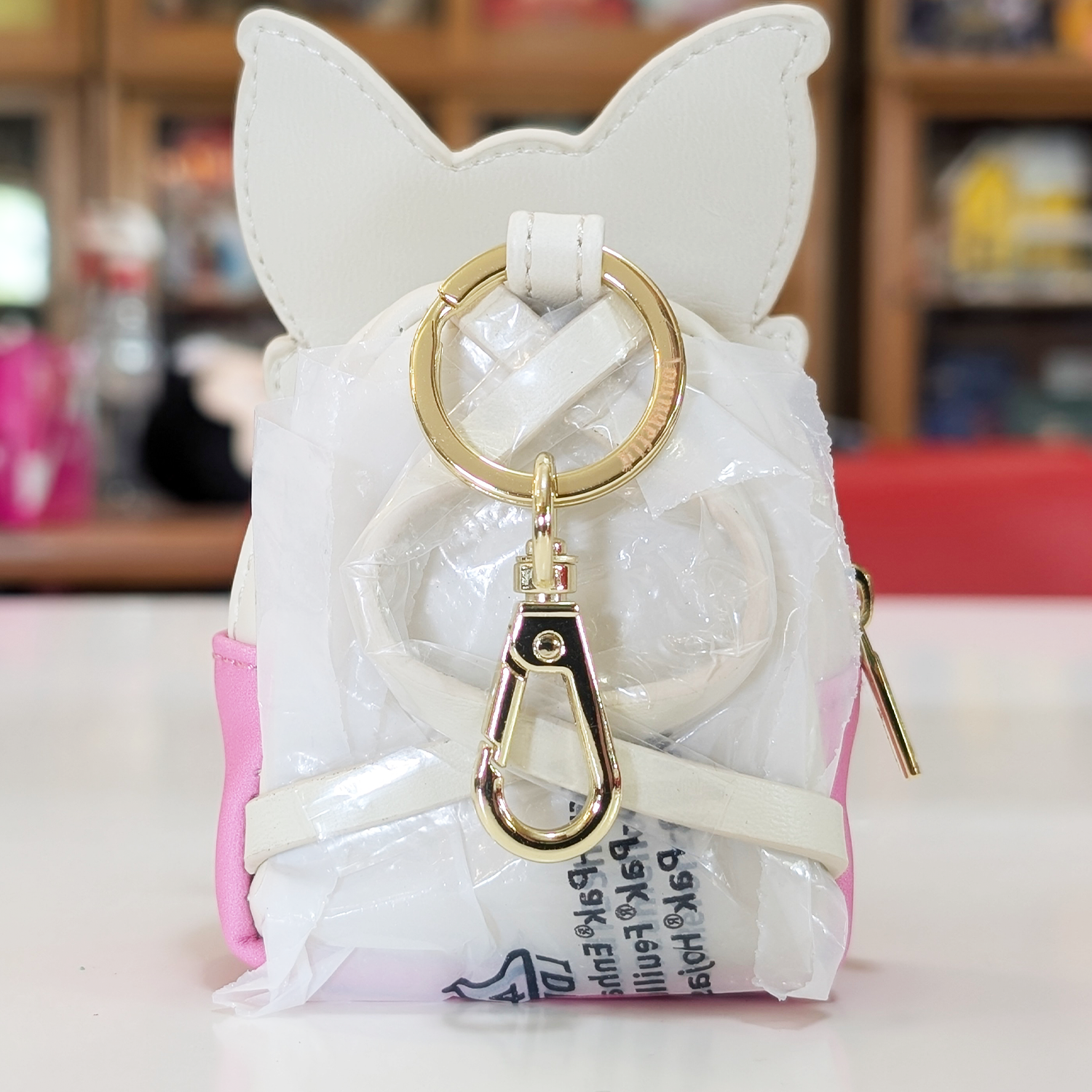 Mini-Loungefly Disney Mickey Mouse Sensational Six Cosplay U-PICK Bag Charm Key Chains new in box by Loungefly featuring white and pink design