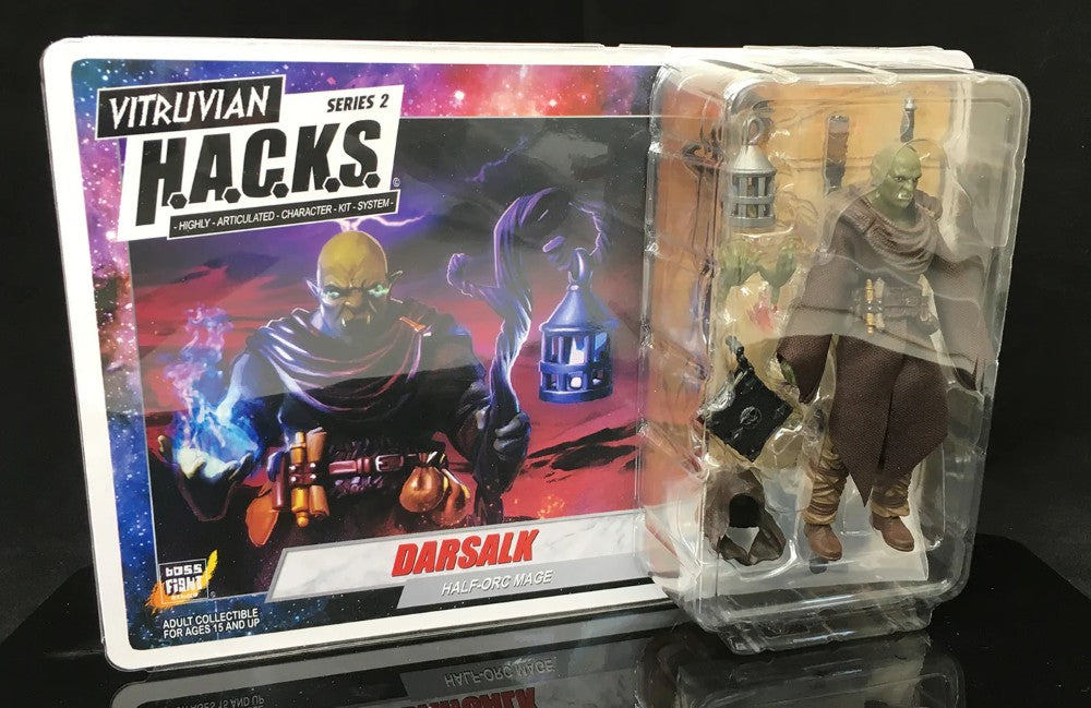 Toy figure in packaging with Vitruvian H.A.C.K.S. series 2 label on a dark background