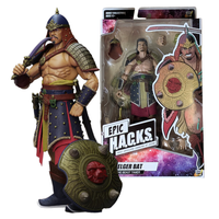 Warrior action figure holding an ornate shield beside its boxed package