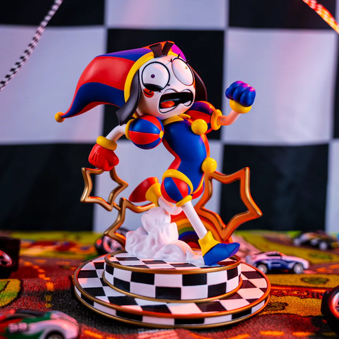 Colorful animated jester figure with exaggerated expression on checkered circular base surrounded by toy cars and racing decor.