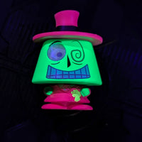 Go Figment black light Disney Doorables figure featuring glowing green character with pink hat and suit from U-Pick series
