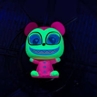 Go Figment black light Disney Doorables mini-figure glowing green face with pink ears and suit from U-Pick blind box series