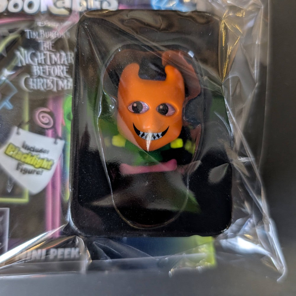 Go Figment Disney Doorables mini-figure with orange devil mask and wide grin from The Nightmare Before Christmas series in sealed blister pack