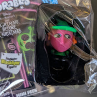 Go Figment Disney Doorables blind box featuring pink-faced miniature character in green hat from The Nightmare Before Christmas series