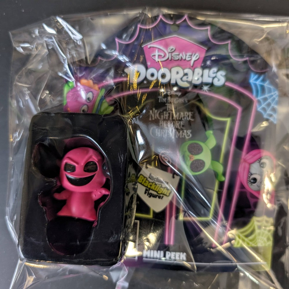 Go Figment Disney Doorables U-Pick mini-figure in pink with black light packaging from The Nightmare Before Christmas series