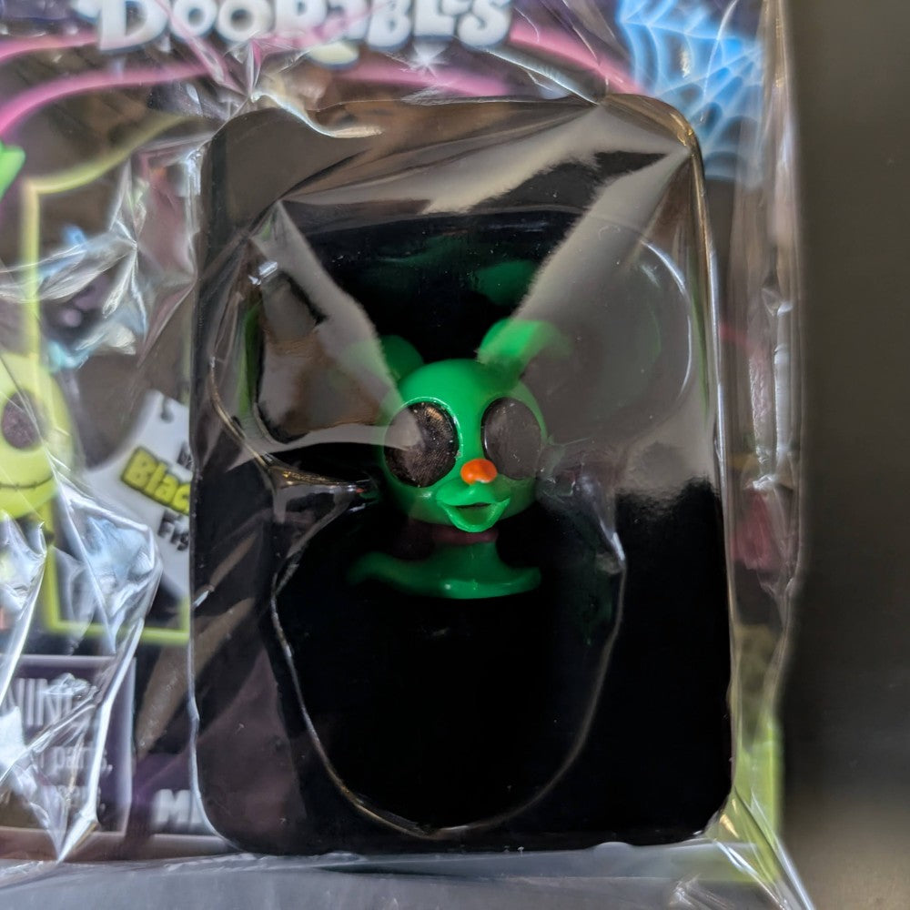 Go Figment Disney Doorables black light mini-figure with glowing green face and orange nose from U-PICK blind box series