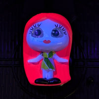 Go Figment Disney Doorables black light mini-figure featuring glowing blue character with bright red hair from U-Pick series