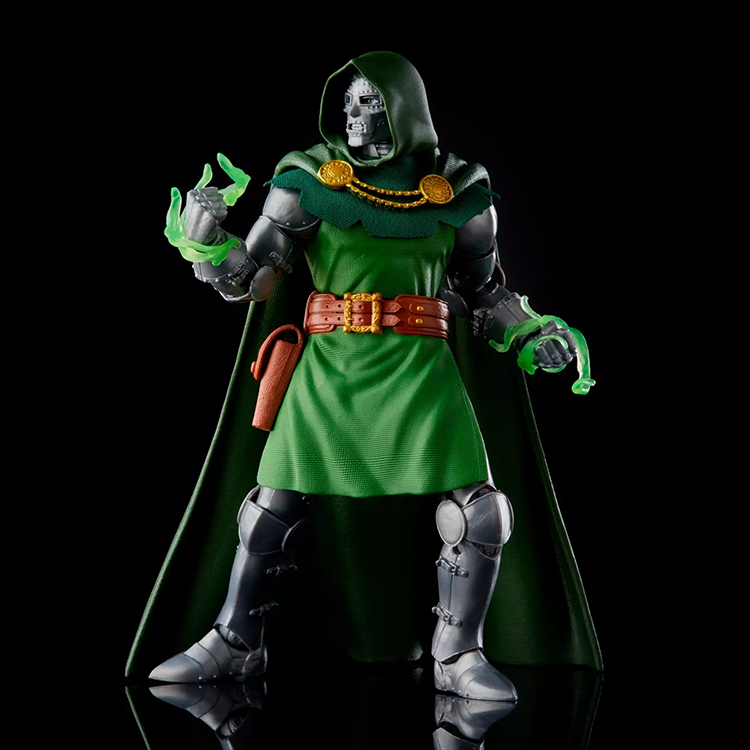 Hasbro Marvel Legends Dr. Doom action figure in vintage style with green cloak and glowing power effects.