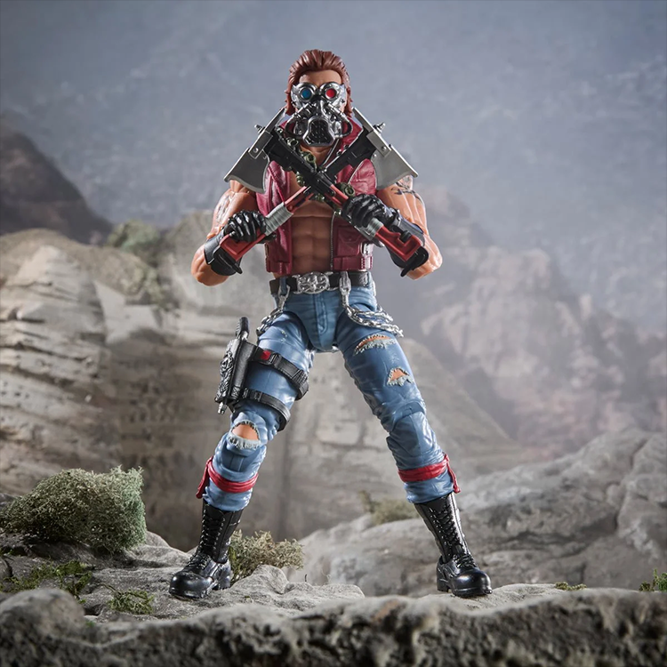 Dreadnok Monkeywrench 6-inch action figure by Hasbro with detailed gear and rugged pose in rocky terrain backdrop