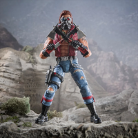 Dreadnok Monkeywrench 6-inch action figure by Hasbro with detailed gear and rugged pose in rocky terrain backdrop