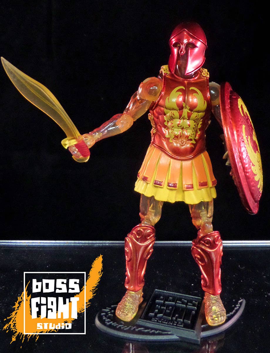 Toy figure of a warrior with a sword and shield, branded 'Boss Fight Studio'.