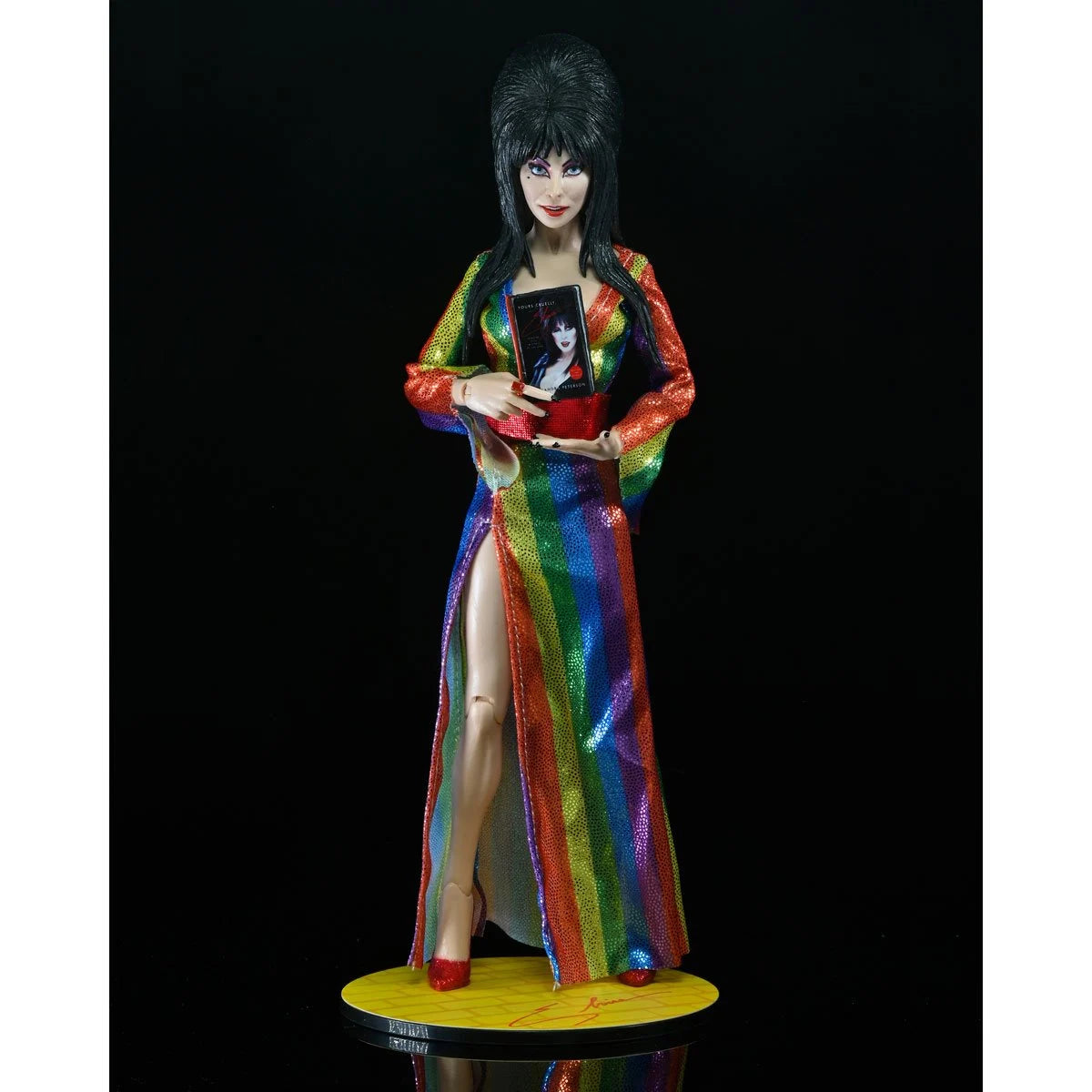 Elvira Over the Rainbow - Mistress of the Dark 8-Inch Clothed Action Figure by Neca in rainbow dress holding photo new in box