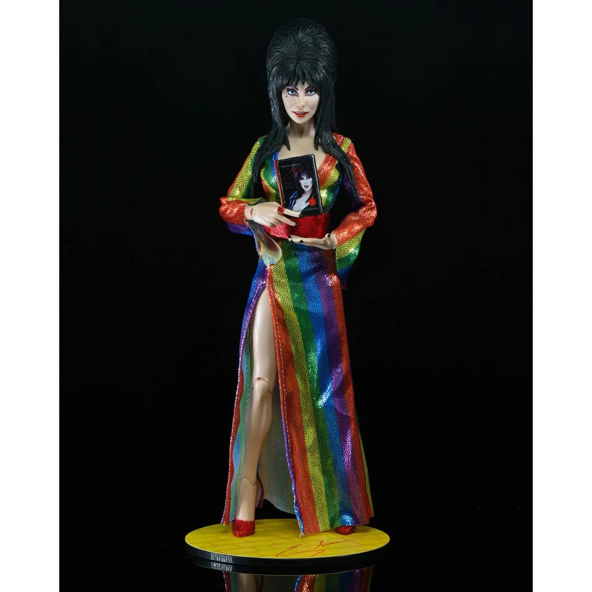 Elvira Over the Rainbow - Mistress of the Dark 8-Inch Clothed Action Figure by Neca in rainbow dress holding photo new in box