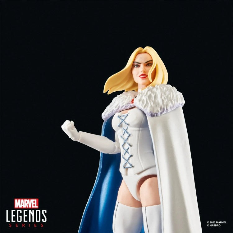 Emma Frost action figure from Marvel Legends series by Hasbro in white outfit with fur cape on black background
