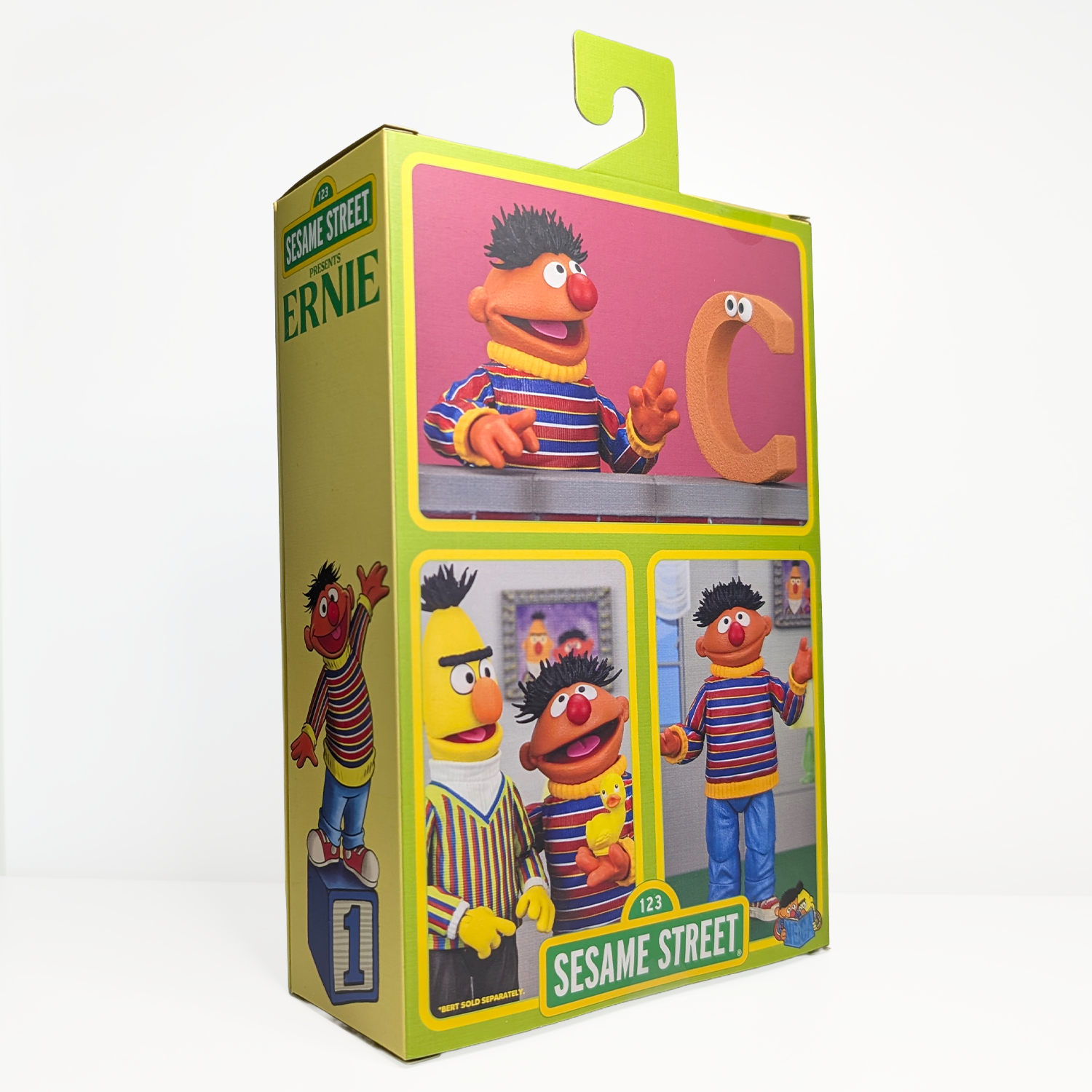 Ernie - Sesame Street Ultimate NECA 7-Inch Scale Action Figure new in box with colorful packaging and character scenes by Neca