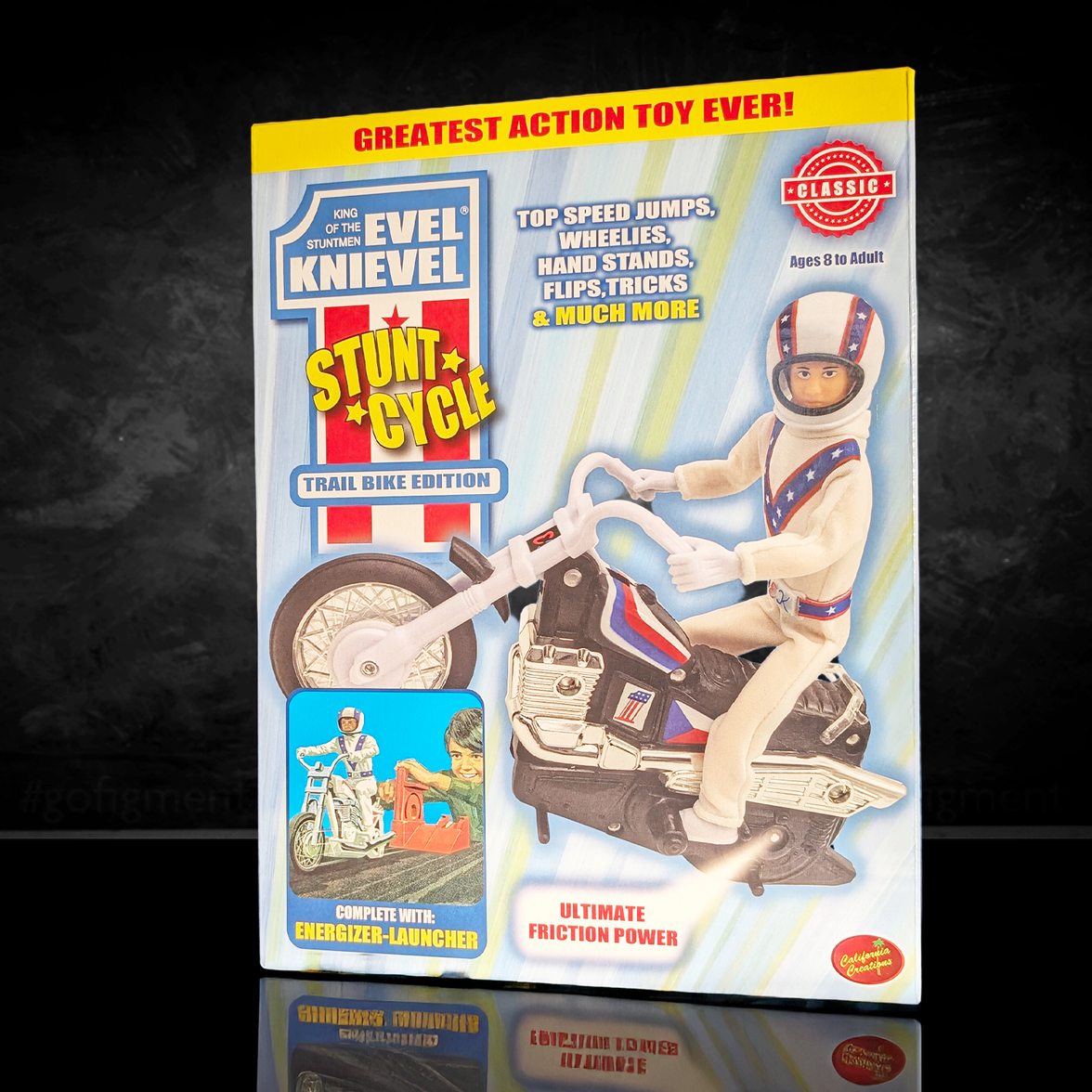 The Original 1970's Evel Knievel Stunt Cycle Upgraded And Advanced NEW by Go Figment featuring a stunt rider on a motorcycle toy packaging.