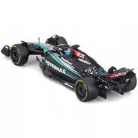 Bburago 1:43 scale die-cast model of Mercedes W15 Formula 1 car driven by George Russell with helmet detail
