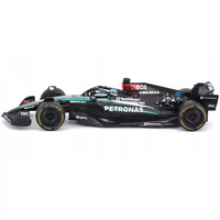Bburago 1:43 scale die-cast Mercedes W15 Formula 1 model featuring George Russell with authentic helmet details
