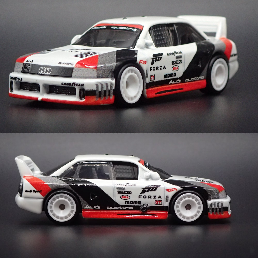 Forza Motorsports Audi 90 Quattro 1:64 Scale Hot Wheels Premium Pop Culture Diecast Car by Mattel in white, black, and red racing livery