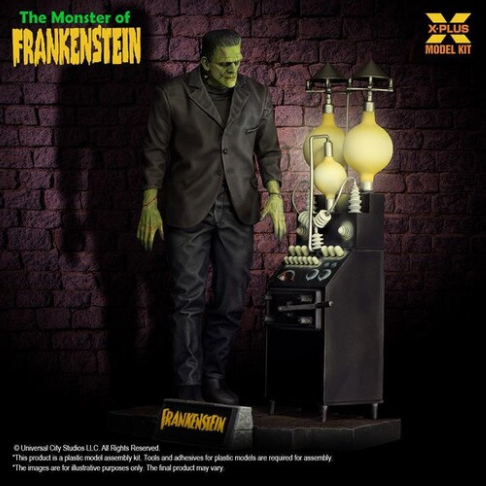 Frankenstein monster figure standing next to vintage-style electrical laboratory equipment against a brick wall background