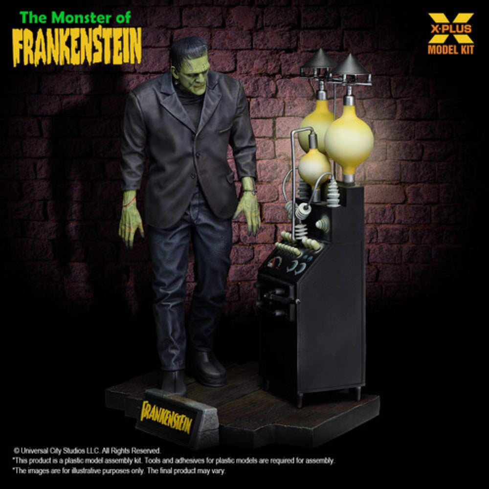 Detailed figurine of Frankenstein’s monster standing beside vintage electrical lab equipment against a brick wall background