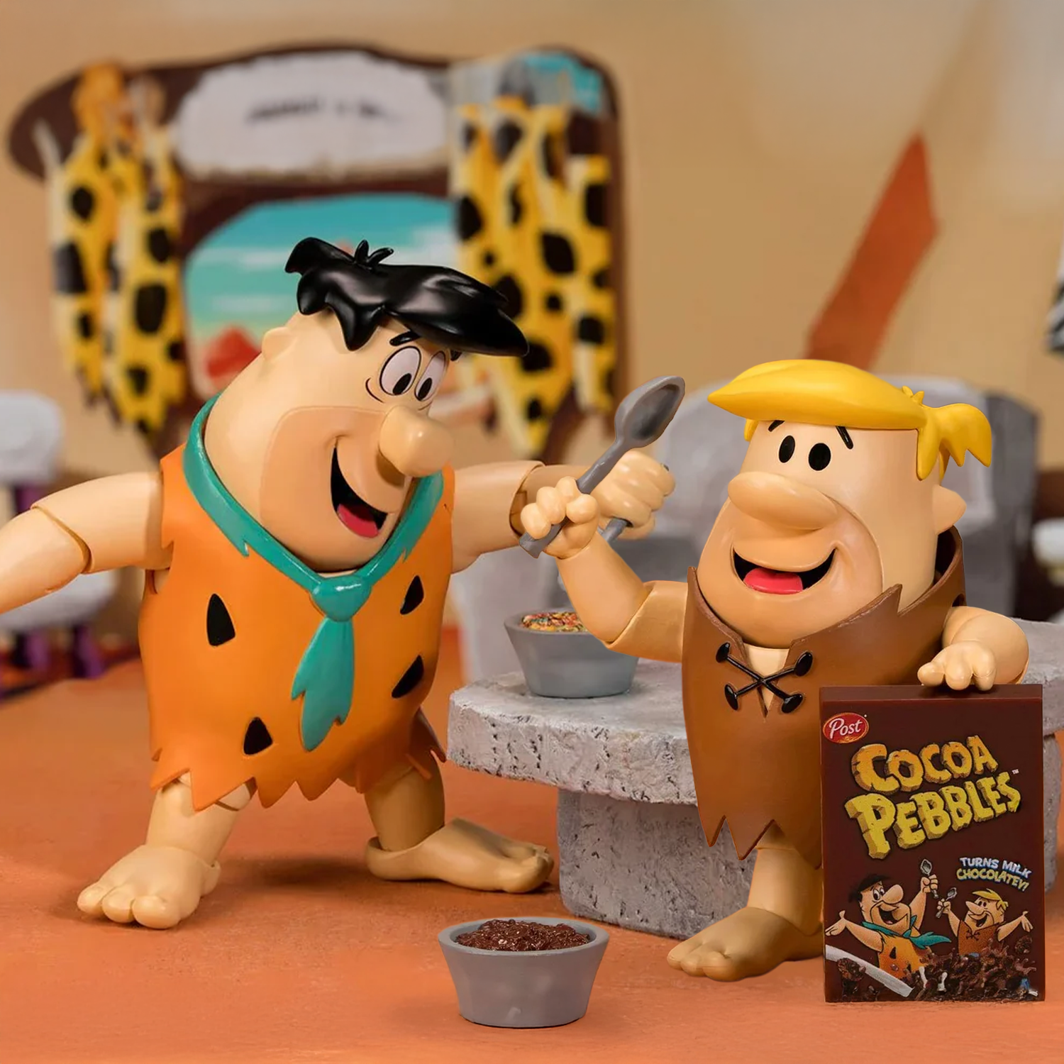 Fred Flintstone & Barney Rubble BUNDLE 1:12 Scale Action Figure - Premium Articulated Fruity Pebbles by Jada Toys with cereal bowls and box.