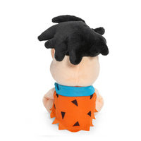 Fred Flintstone Phunny Plush: Hot-Headed, 7.5-Inch, Premium Quality Plush from Bedrock! by Kidrobot sitting with black hair and orange outfit