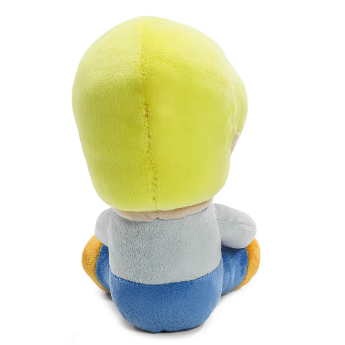 Scooby-Doo Fred 8-Inch Phunny Plush by Kidrobot Collectible Plush Toy seated facing away with bright yellow hair and blue pants