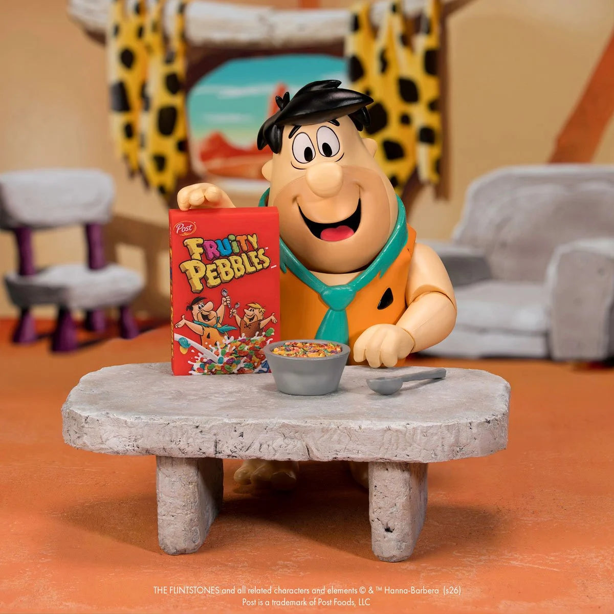 Fred Flintstone 1:12 Scale Action Figure - Premium Articulated Fruity Pebbles by Jada Toys with cereal bowl and table accessory new in box