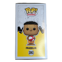 Funko Pop! Franklin figure #2093 holding a red and white beach ball in original packaging with comic strip background