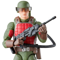 Military action figure wearing a green helmet and red body armor while holding a rifle