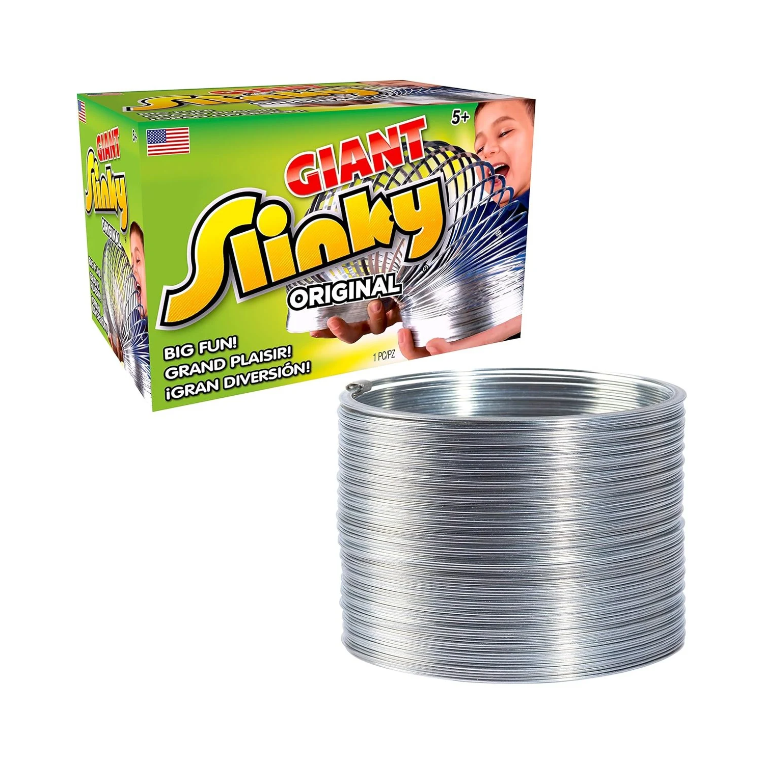 Large silver metal coil toy shown next to bright green packaging featuring a child playing and bold yellow and red text.